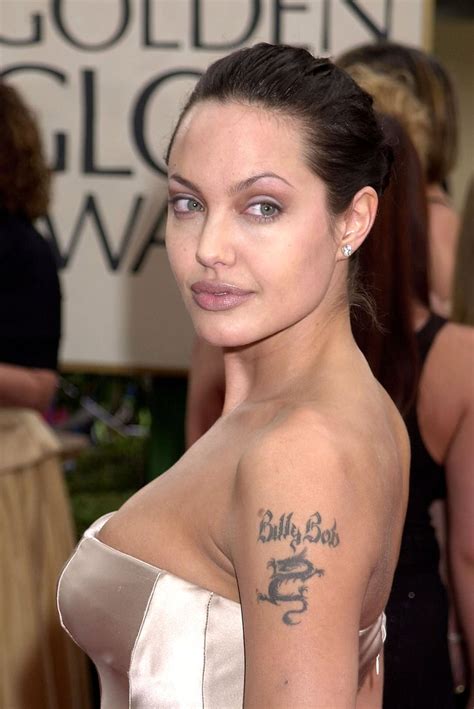 Dragon On Her Left Arm Angelina Jolies Tattoos