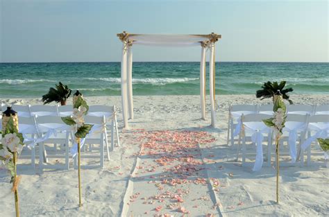 All White With Light Pink Rose Petals Photo And Set Up By Sunset Beach
