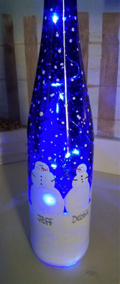 Snowman light up wine bottle decorative light up wine bottle | Etsy | Bottle crafts, Wine bottle ...