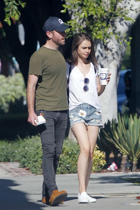 Lily Collins And Charlie Mcdowell Wrap Arms Around Each Other While Out