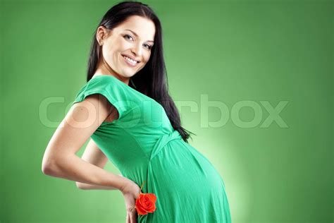 Portrait Der Schwangeren Frau Mit Rose Stock Bild Colourbox