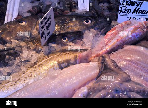 A Variety Of Fresh Wet Fish For Sale At A Fishmongers Stall On Borough