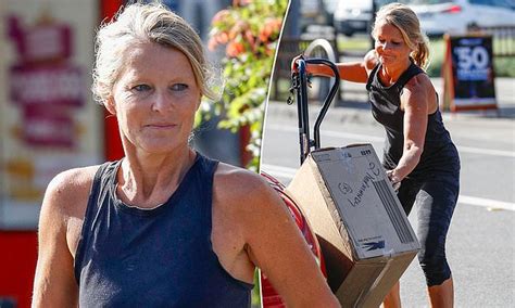 simone callahan 50 shows off her incredible muscles as she collects some items from kmart