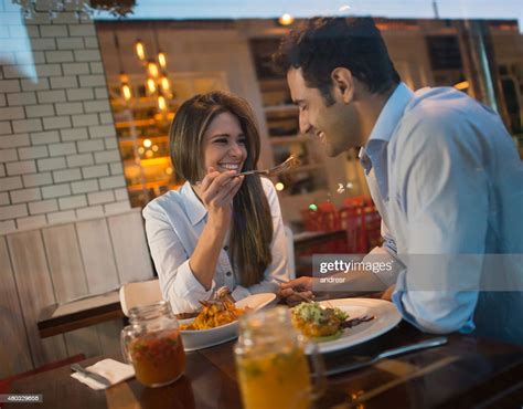 Couple In A Romantic Dinner At A Restaurant High-Res Stock Photo