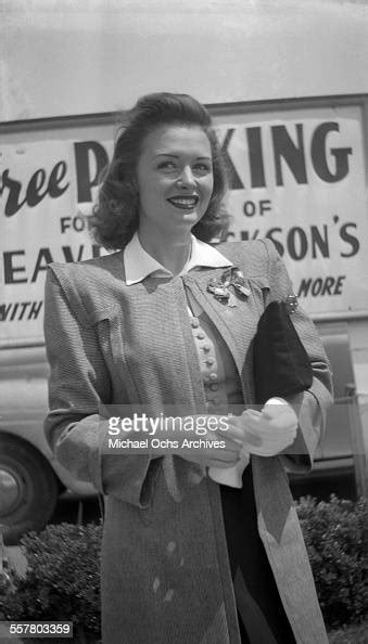 Actress Donna Reed Smiles As She Poses On The Street In Los Angeles