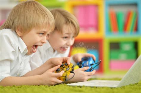 Portrait Of Two Boys Playing Computer Games Stock Image Image Of