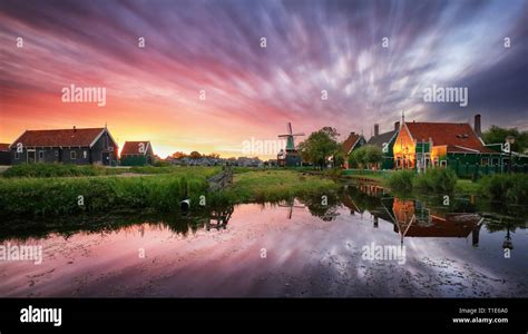 Dutch Landscape With Windmill At Dramatic Sunset Zaandam Amsterdam