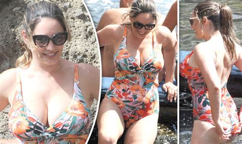 Kelly Brooks Ample Assets Take Centre Stage In Busty Floral Swimsuit