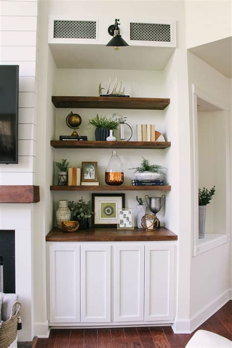 Fresh living room ideas with tv on wall. Styling the floating shelves in our modern farmhouse ...