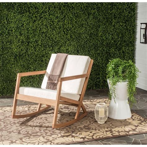 Enjoy free shipping & browse our great selection of patio chairs, patio gliders, wicker chairs and more! Safavieh Vernon Teak Brown Outdoor Patio Rocking Chair ...