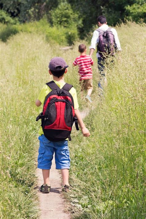 Father With Children Walking In Nature Stock Image Image Of Happiness
