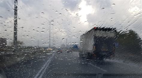 Rainy Weather On The Highway Traffic Viewed Through A Car Window Stock