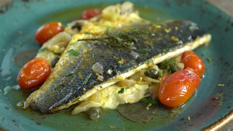 Greek Sea Bass Baked With Santorini Assyrtico Wine Capers Leaves And Herbs Greek Food