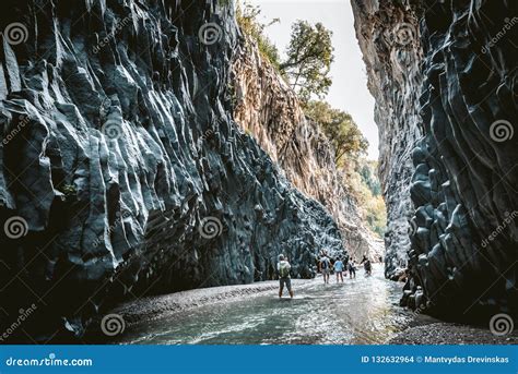 Tourists Walking In Alcantara Gorge And Alcantara River Park In Sicily