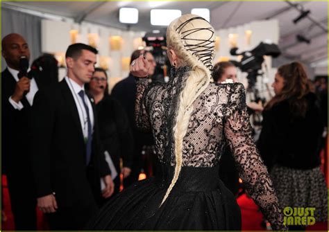 Lady Gaga Rocks A Long Dress Long Braid And White Roses At Grammys 2018