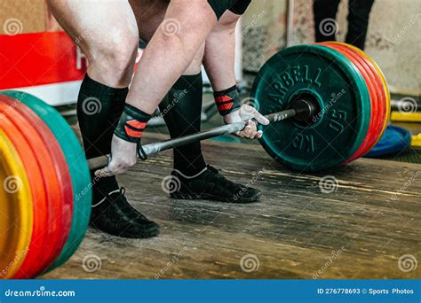 Athlete Powerlifter Performing Deadlift Heavy Barbell At Powerlifting