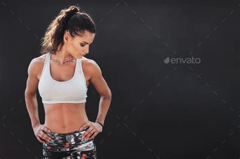 Fitness Woman Standing With Her Hands On Hips Artofit