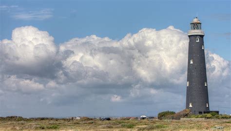 Dungeness Lighthouse And Clouds Photograph By Steve Stringer