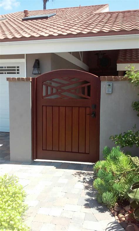 Custom Wood Gate With Decorative Wood Picket Top Section By Garden