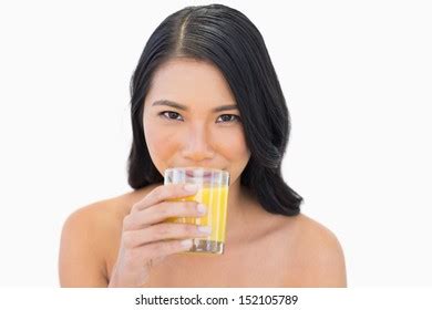 Sensual Nude Model Drinking Orange Juice Stock Photo