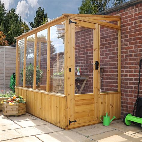 My dad and i have been working all week on building this lean to greenhouse as an addition to my shop. 8 x 4 Waltons Lean-to Pent Wooden Greenhouse | Waltons Sheds