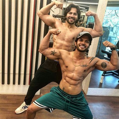 Varun Dhawan Bicep Showoff With Gym Buddy Gym Buddy Varun Dhawan Bollywood Actors Biceps