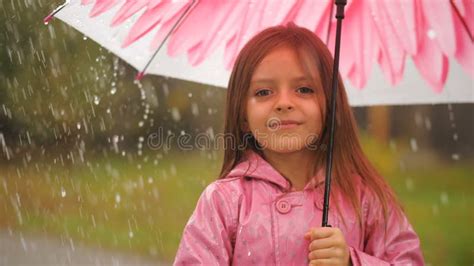 Little Girl Under Rain Having A Fun Stock Footage Video Of Pink Girl