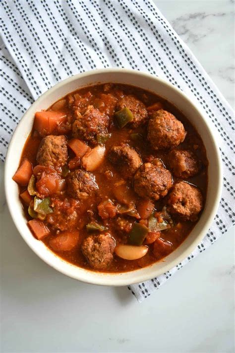 Add 2 tbsp of olive oil, then add your onions, peppers, salt & pepper, garlic, parsley, basil, crushed red pepper and oregano. Slow Cooker Meatball Stew {Easy & Tasty} | Hint of Healthy