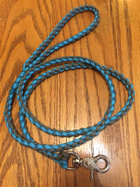 The grab handle is a spiraling half knot and the lead is a. Paracord dog leash with 4 strand braid. | Paracord dog leash, Paracord bracelets, 4 strand braids
