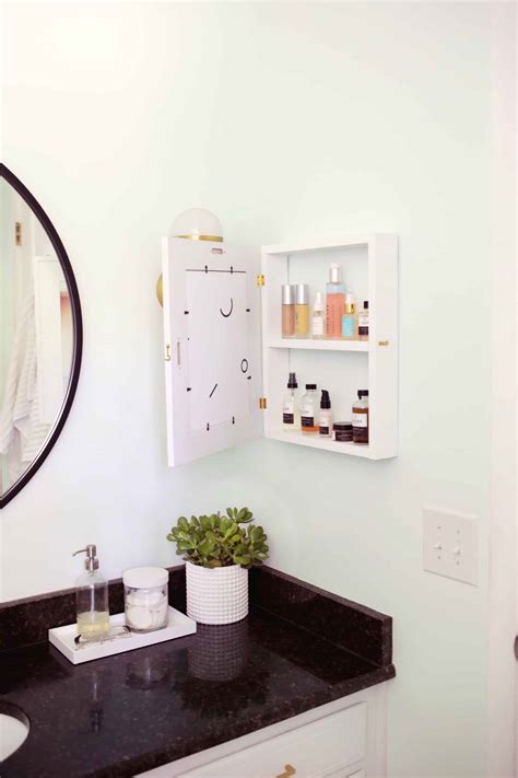 Just go with custom lumber or pinewood slats to duplicate this handsome model. Hidden Medicine Cabinet DIY - A Beautiful Mess
