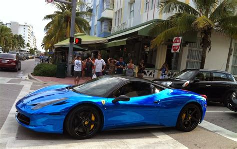 Save $99,584 on a used ferrari near you. Blue Ferrari 458 Italia | Reflective / Mirror wrap with black rims. On Ocean Drive | Miami Beach ...