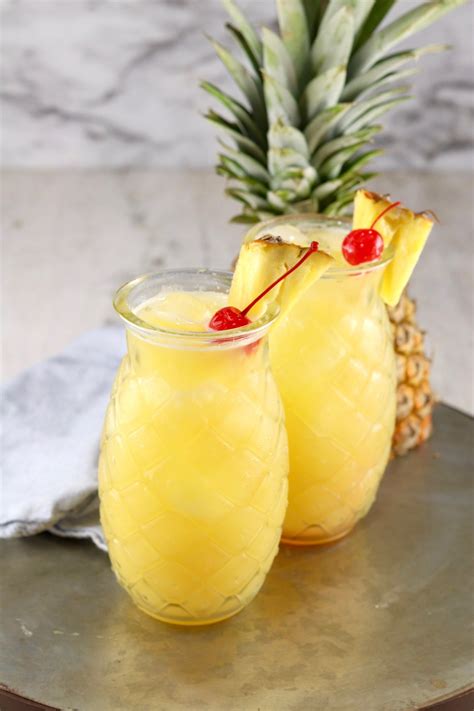 Pineapple Fuzzy Navel Is A Super Simple And Delicious Party Cocktail I M Throwing Some