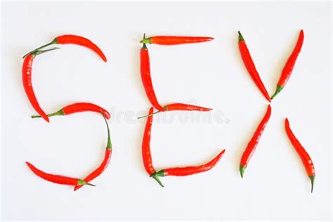 Red Chili Peppers On A White Surface Laid Out The Inscription Sex Stock Image Image Of