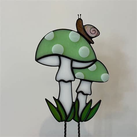 DOES NOT INCLUDE PLANT This Cute Mushroom Plant Stake Complete With