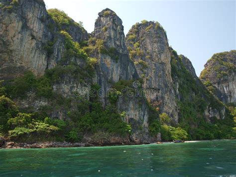 A Beautiful Panorama View With Rocks Crystal Clear Water And White