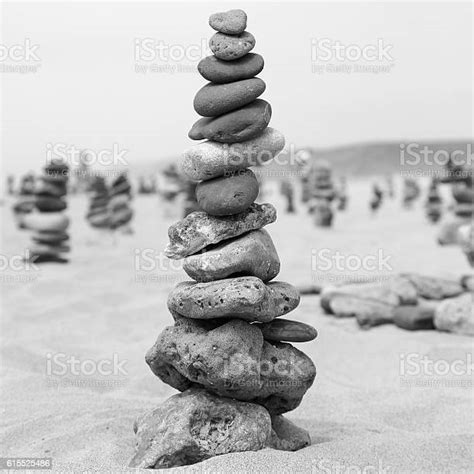 Balanced Stones On A Beach Black And White Stock Photo Download Image