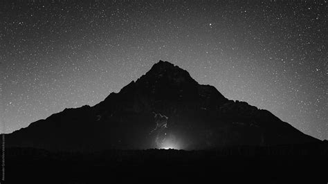 Black Mountain In Night At Starry Sky By Stocksy Contributor