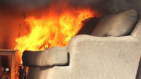 Fabric Covered Sofa On Fire Stock Footage Video 100