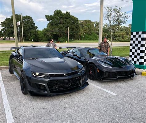 Chevrolet Camaro Zl1 1le Painted In Nightfall Gray Metallic Next To A