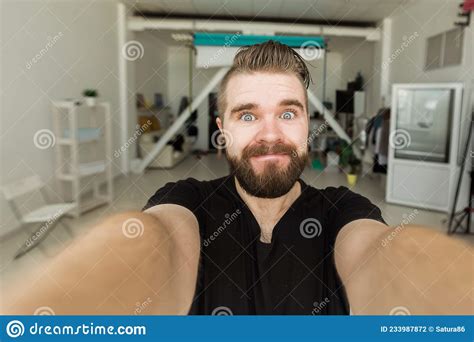 happy bearded man taking selfie or having video call at home technology people and lifestyle