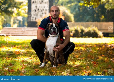 Man Holding Dog Stock Photo Image Of Animal Cheerful 34600922