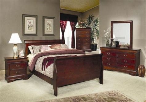 A Bedroom Scene With Focus On The Bed And Dresser