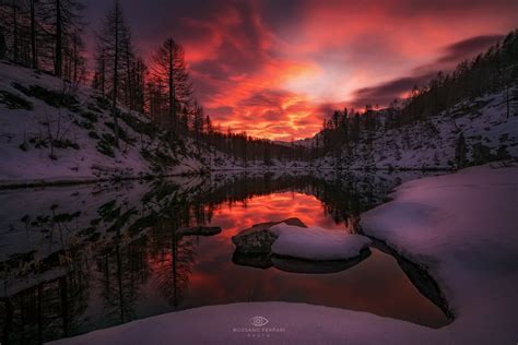 Sunset Over Winter Mountains By Rossano Ferrari