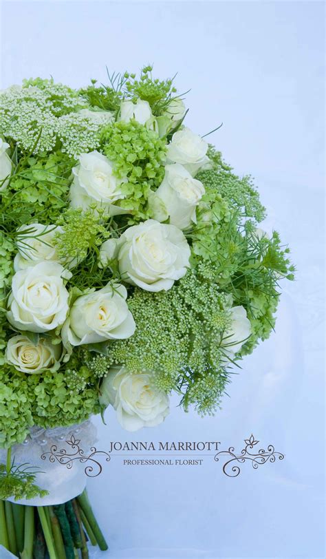 Bridal Bouquet Made Of Cream Spray Roses Lime Green Vibernum And White