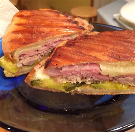 Cuban Sandwich Using Slow Cooked Cuban Pork Black Forest Ham Swiss Cheese Mustard And Pickles