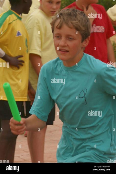 School Boy Running At School Sports Day Stock Photo Alamy