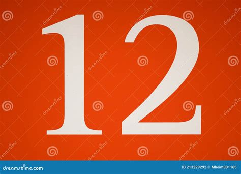 Colorful Red And White Sign With The Number Twelve 12 Stock Photo