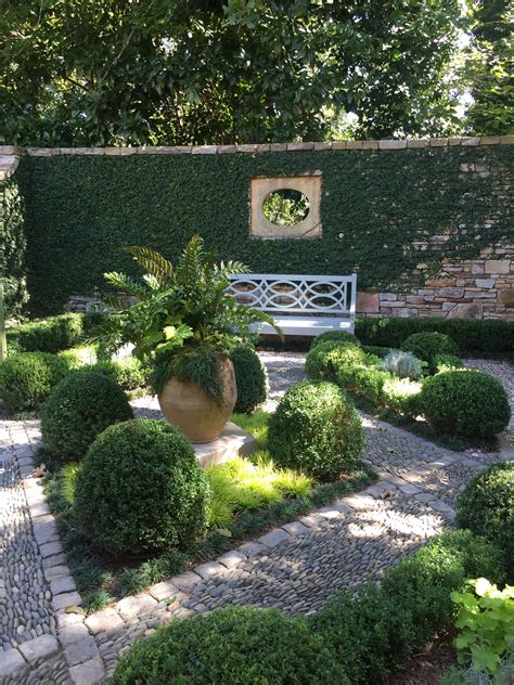 Walled Courtyard Garden With Boxwoods By Howard Design Studio Walled