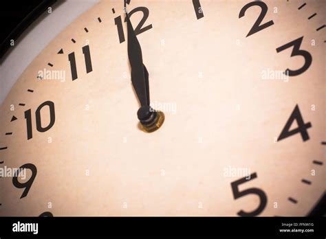 A Clock On Twelve Oclock Or Midnight Stock Photo Alamy