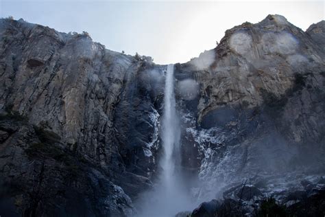 Free Stock Photo Of Narrow Waterfall On High Mountain Cliff